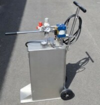 A two wheel reservoir with a foot palte and two wheel cart plus a hand pump and air driven pump mounted on top. Fitted a hose.