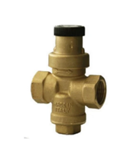 A brass valve casting showing the complicated shapes. This has threaded ports either end, an adjusting knob above and a cast feature below.